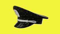 A police cap is covered with binary code on a bright yellow background.