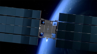 A satellite with extended solar panels orbits above Earth, with the planet’s blue surface and atmosphere visible in the background.
